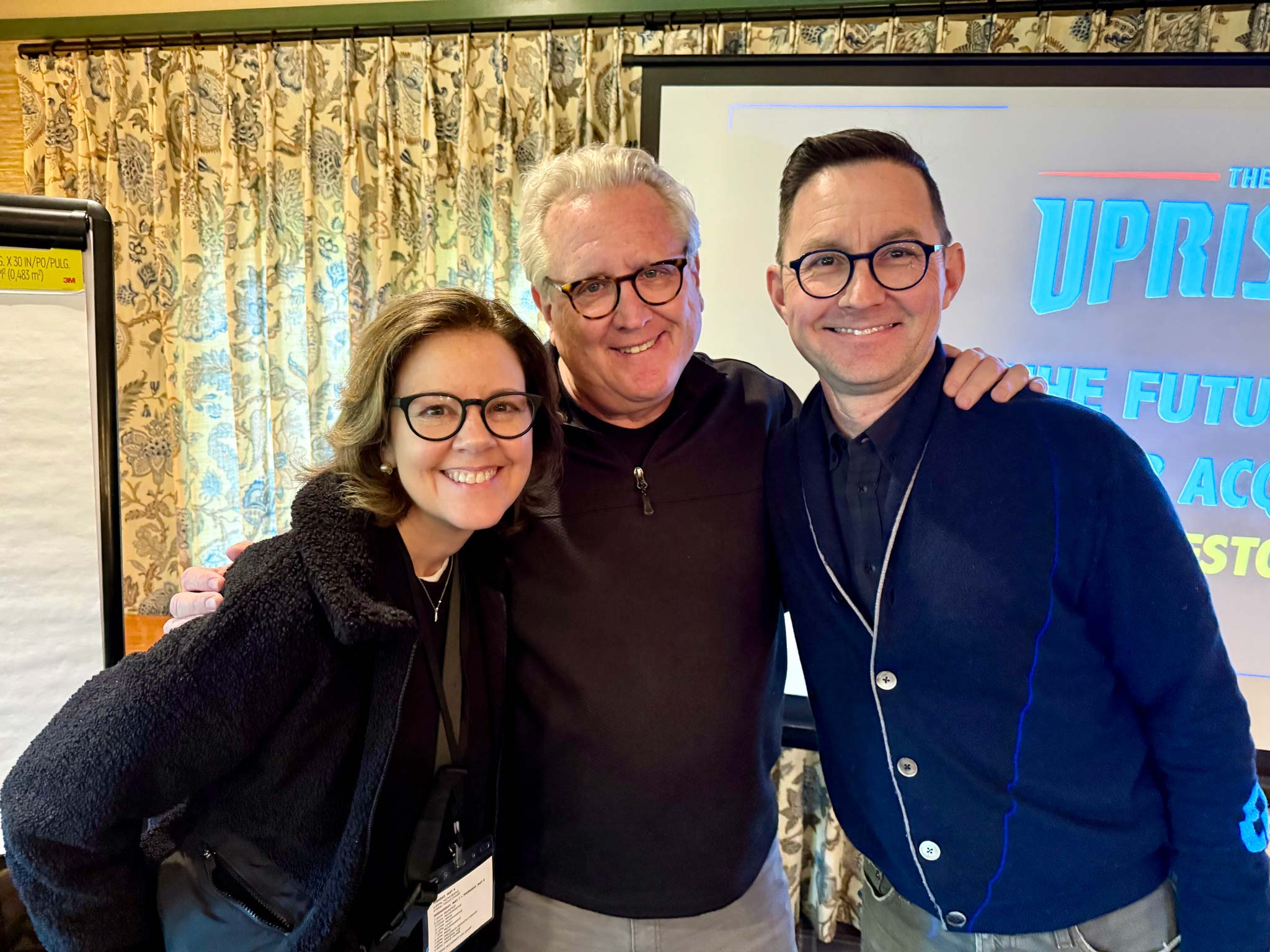 Ann, Mark, and Andy post for a photo.