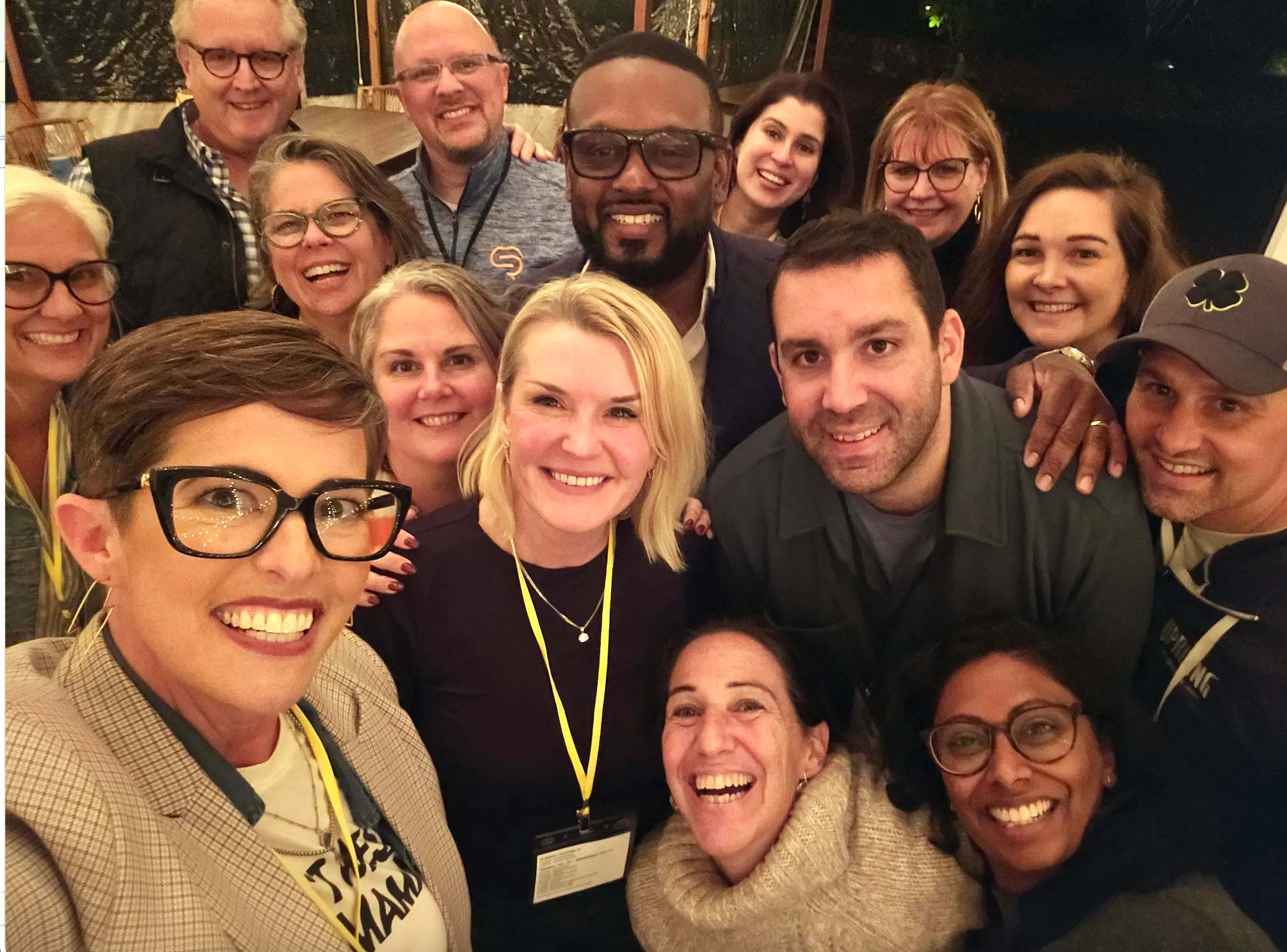 Smiling Uprising attendees posing for a photo